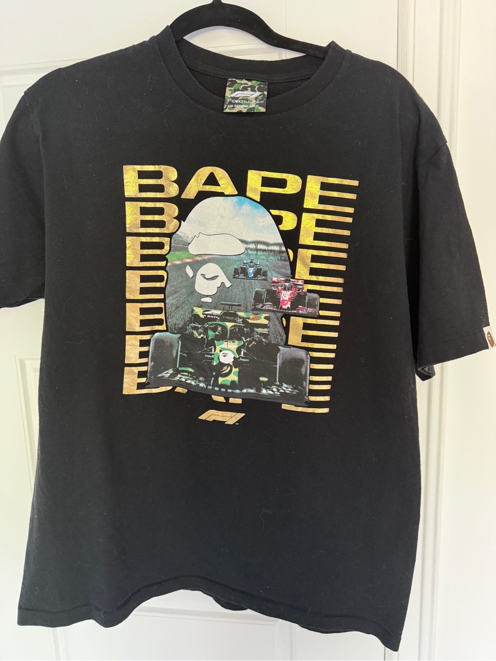 Bape Black Tee with Gold and Green Racing Graphic